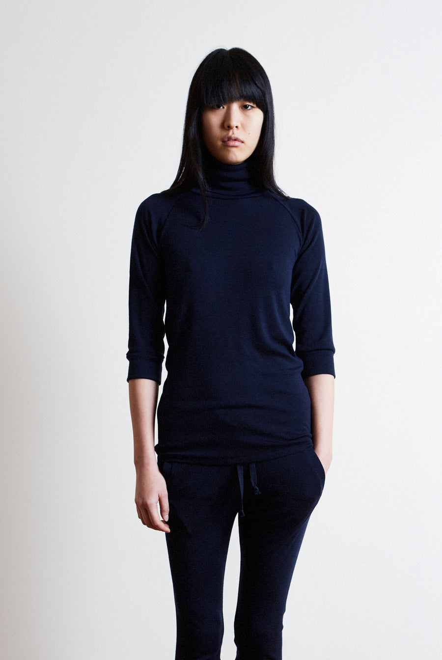 the white briefs 3/4 sleeve roll-neck sweater in 100% fine merino wool rib