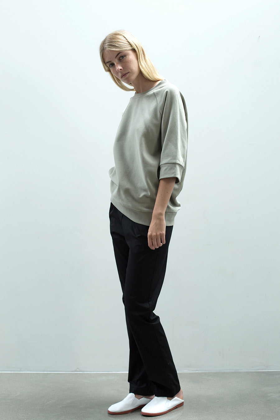 Relaxed fit women's khaki sweatshirt with 3/4 length sleeves and made from a soft 100% organic cotton terry