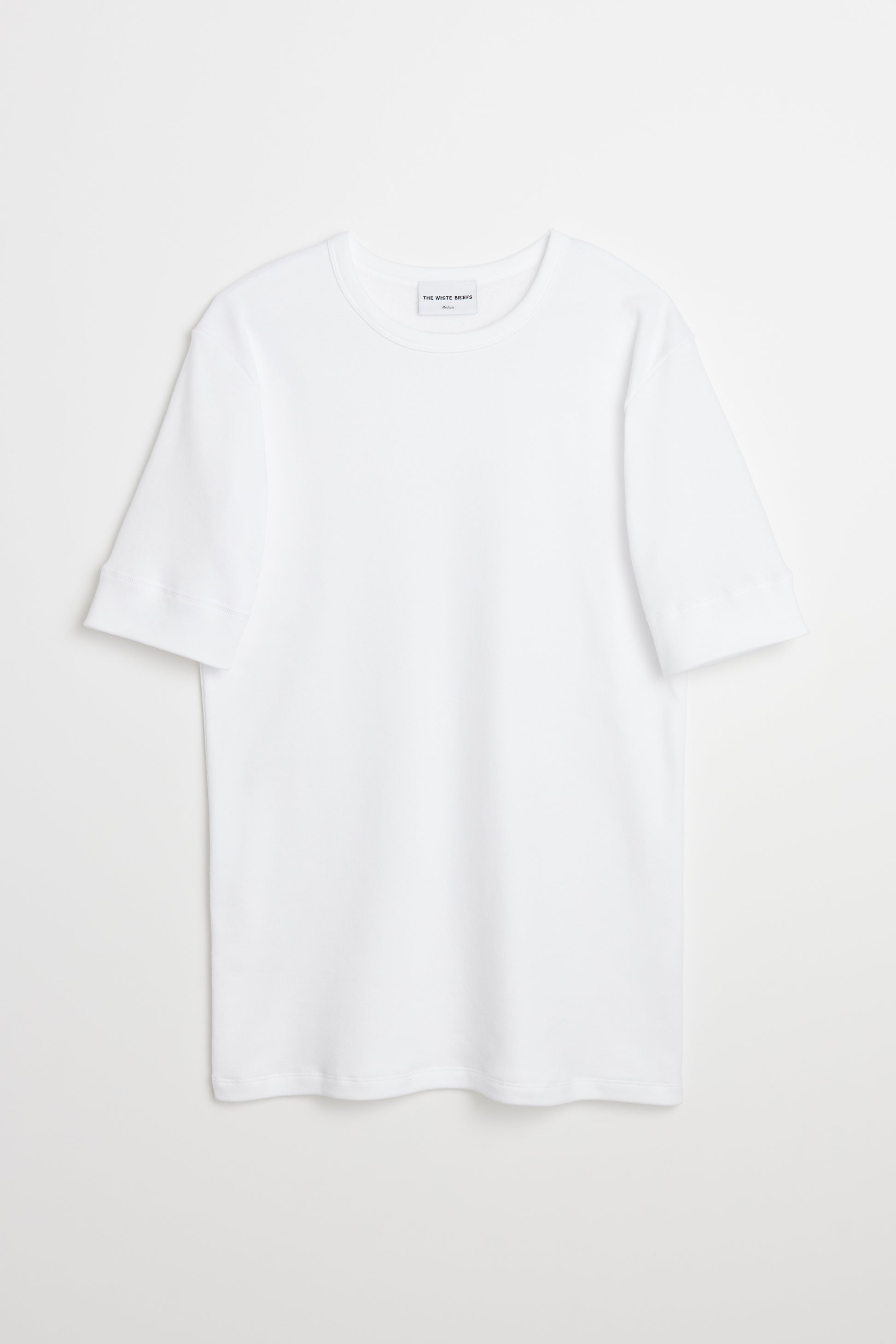 The sleeve is folded with a 4 cm edge stitched with a flat seam for that sturdier look. The combed cotton fleece makes you warm on the inside 